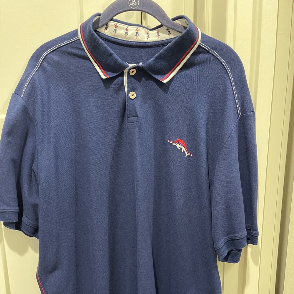Really nice Tommy Bahama polo. Patriotic colors. Size XL. Excellent condition.